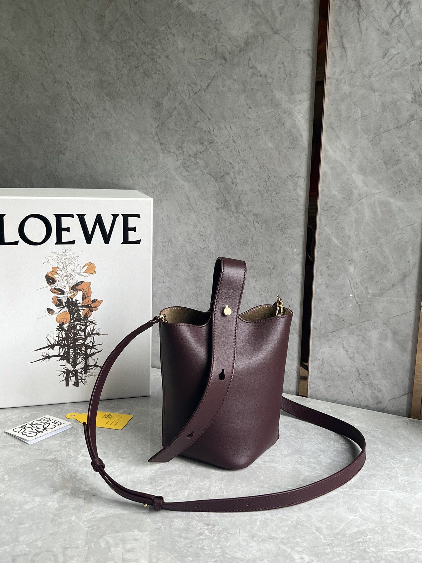 Loewe Mini Pebble Bucket in Mellow Calfskin Dark Purple